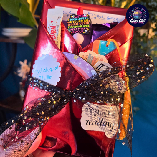 Mystery Book Bundle with sparkly bookmark and beaded pen and other treats